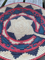 Hand woven wall decor basket in Southwestern Pattern
