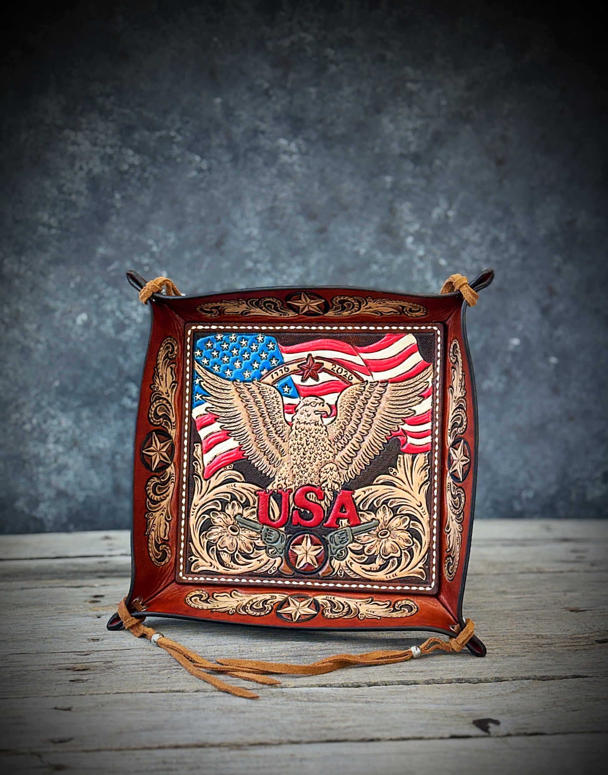 Handcrafted patriotic leather valet tray with 1776-2026 eagle design and tooled Texas star details
