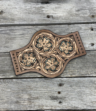 Hand tooled floral leather wedding bouquet wrap with turquoise highlights, shaped design, handmade in Texas by Cherokee Rose Custom Leather