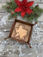 Hand-tooled leather valet tray with carved Texas state outline and Lone Star background, handmade by Cherokee Rose Custom Leather in Texas.