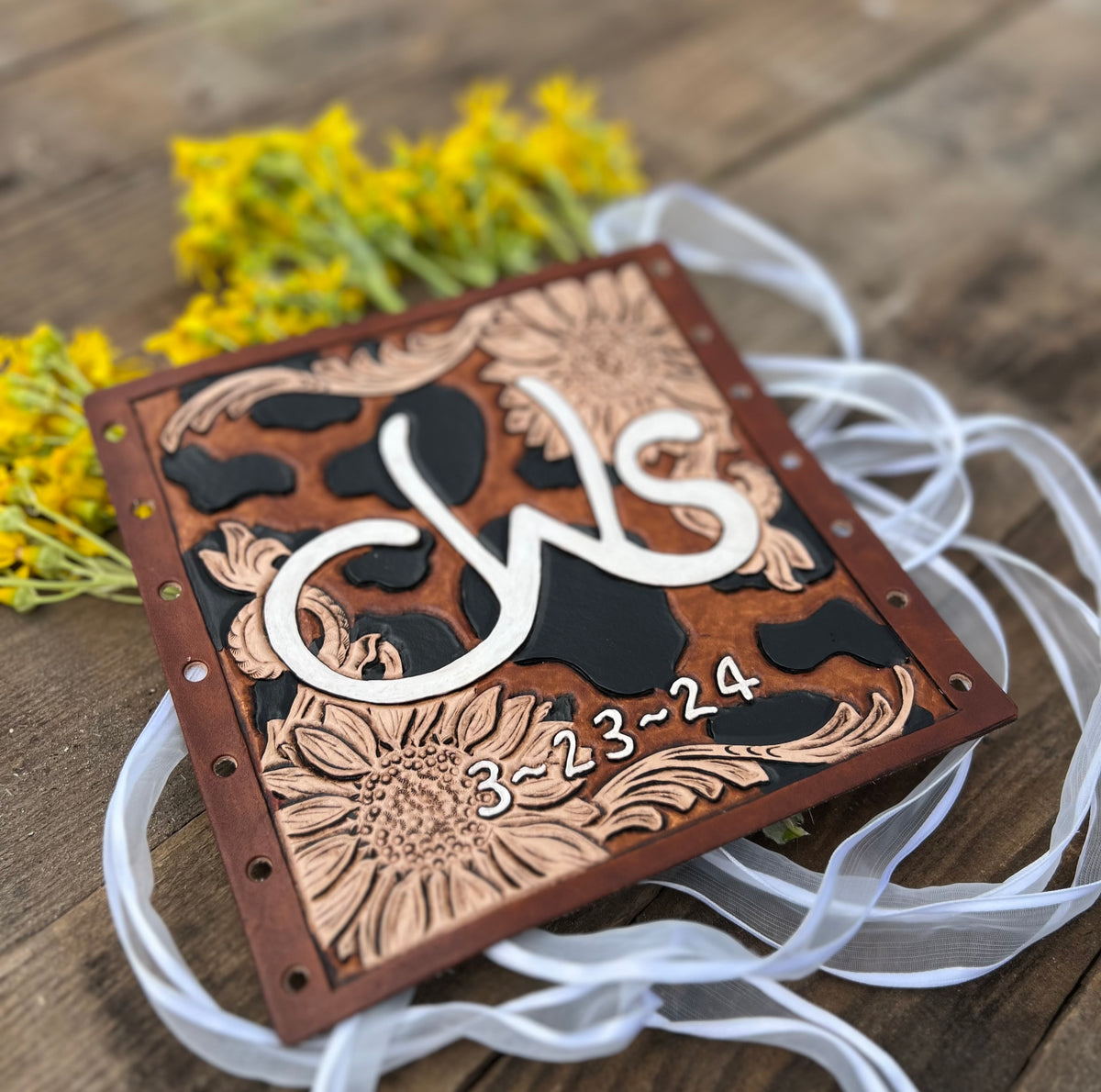 Tooled leather bridal bouquet wrap for rustic wedding