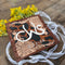 Tooled leather bridal bouquet wrap for rustic wedding