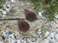 Large hand-stamped leather teardrop earrings with flower and geometric design, chocolate brown with sterling silver hooks, handmade by Cherokee Rose Custom Leather in East Texas.