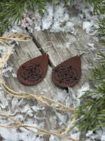 Large hand-stamped leather teardrop earrings with flower and geometric design, chocolate brown with sterling silver hooks, handmade by Cherokee Rose Custom Leather in East Texas.