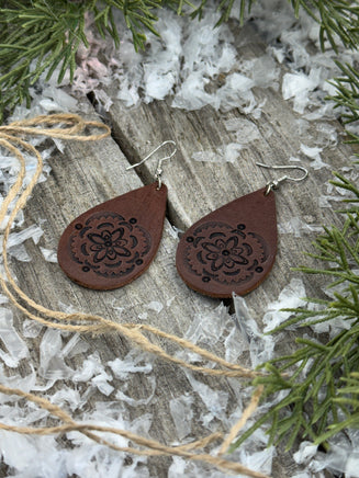 Large hand-stamped leather teardrop earrings with flower and geometric design, chocolate brown with sterling silver hooks, handmade by Cherokee Rose Custom Leather in East Texas.