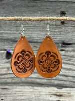 Large light tan teardrop leather earrings with hand-stamped geometric design and sterling silver hooks, handmade by Cherokee Rose Custom Leather in East Texas.