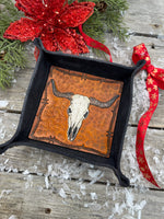 Hand-tooled leather valet tray with carved Texas longhorn skull and barbed wire border, black-dyed leather tray handmade by Cherokee Rose Custom Leather in Texas.