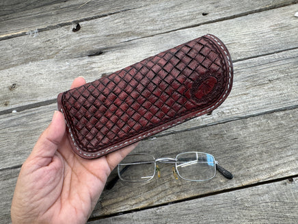Hand dyed Bordeaux leather eyeglasses case with woven basketweave pattern, handmade by Cherokee Rose Custom Leather
