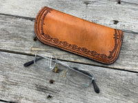 Hand stamped leather eyeglasses case with barbed wire and geometric Western pattern, handmade by Cherokee Rose Custom Leather