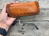Hand stamped leather eyeglasses case with barbed wire and geometric Western pattern, handmade by Cherokee Rose Custom Leather