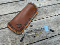 Hand tooled leather eyeglasses case with turquoise feather and floral corner design, handmade by Cherokee Rose Custom Leather