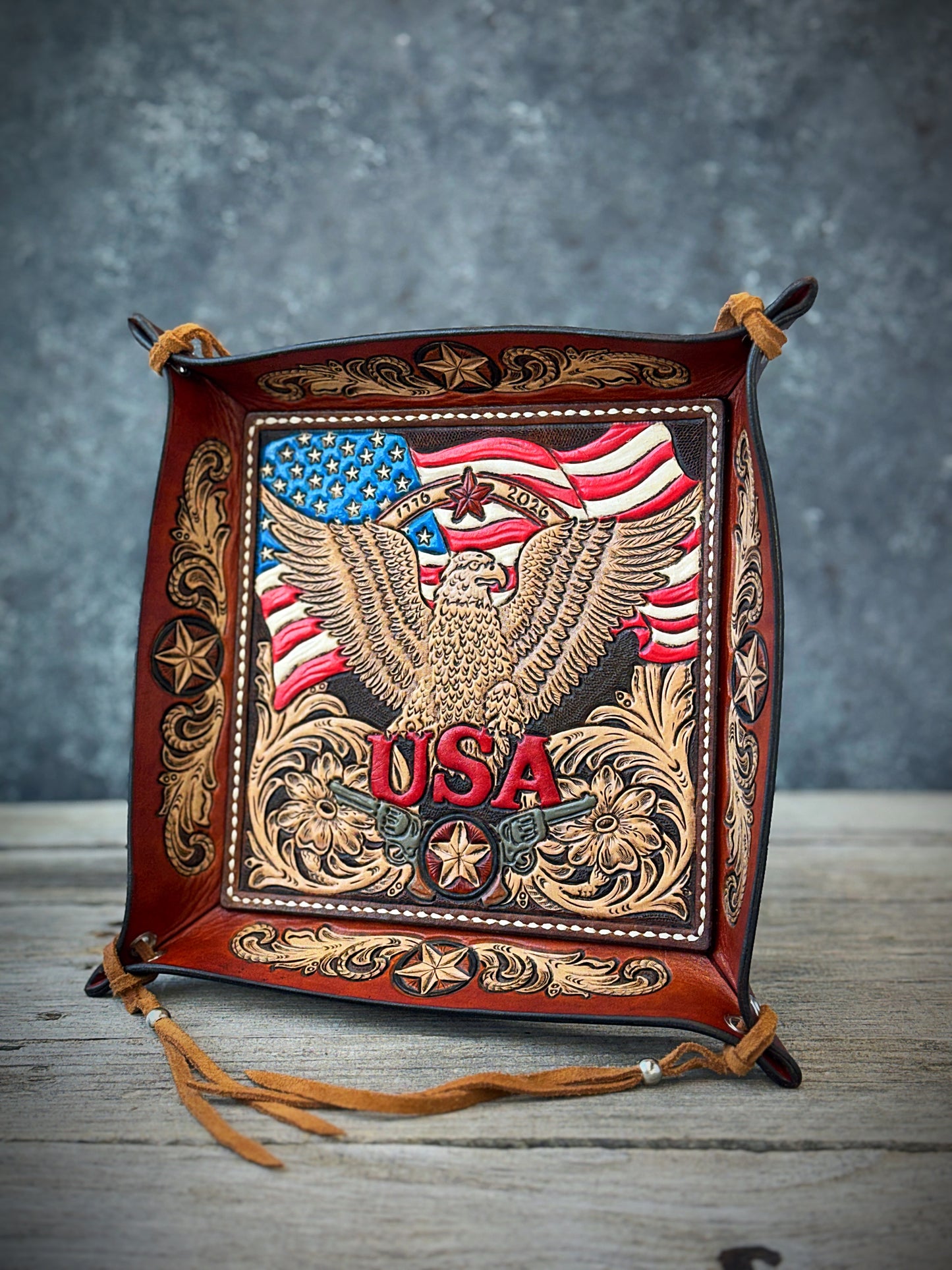 Handcrafted patriotic leather valet tray with 1776-2026 eagle design and tooled Texas star details