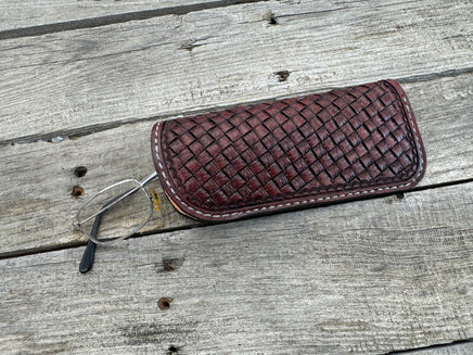 Hand dyed Bordeaux leather eyeglasses case with woven basketweave pattern, handmade by Cherokee Rose Custom Leather