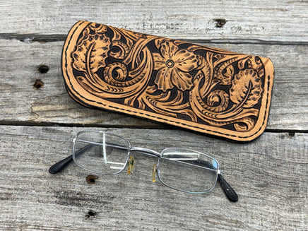 Fully hand carved Western floral leather eyeglasses case with black stitching, handmade by Cherokee Rose Custom Leather