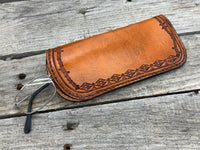 Hand stamped leather eyeglasses case with barbed wire and geometric Western pattern, handmade by Cherokee Rose Custom Leather