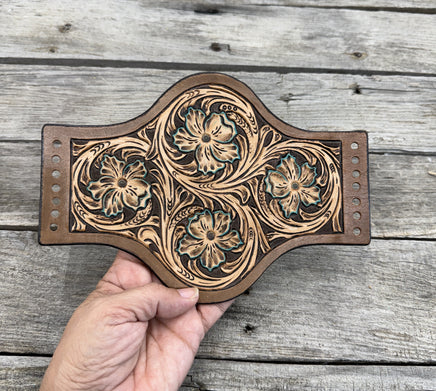 Hand tooled floral leather wedding bouquet wrap with turquoise highlights, shaped design, handmade in Texas by Cherokee Rose Custom Leather