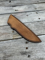 Handmade light brown leather knife sheath for 6–6½" fixed blade knives, hand stitched with brown waxed thread by Cherokee Rose Custom Leather.