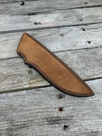 Handmade light brown leather knife sheath for 6–6½" fixed blade knives, hand stitched with brown waxed thread by Cherokee Rose Custom Leather.