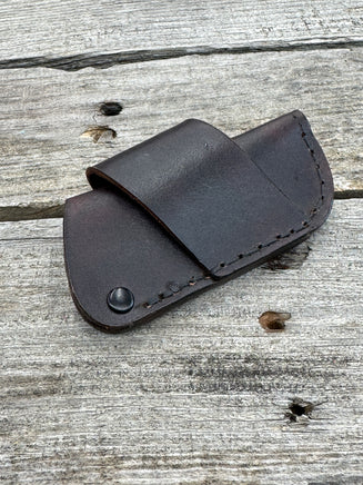 Handmade chocolate brown leather knife sheath with black rivet hardware, horizontal carry design for small pocket knives by Cherokee Rose Custom Leather.