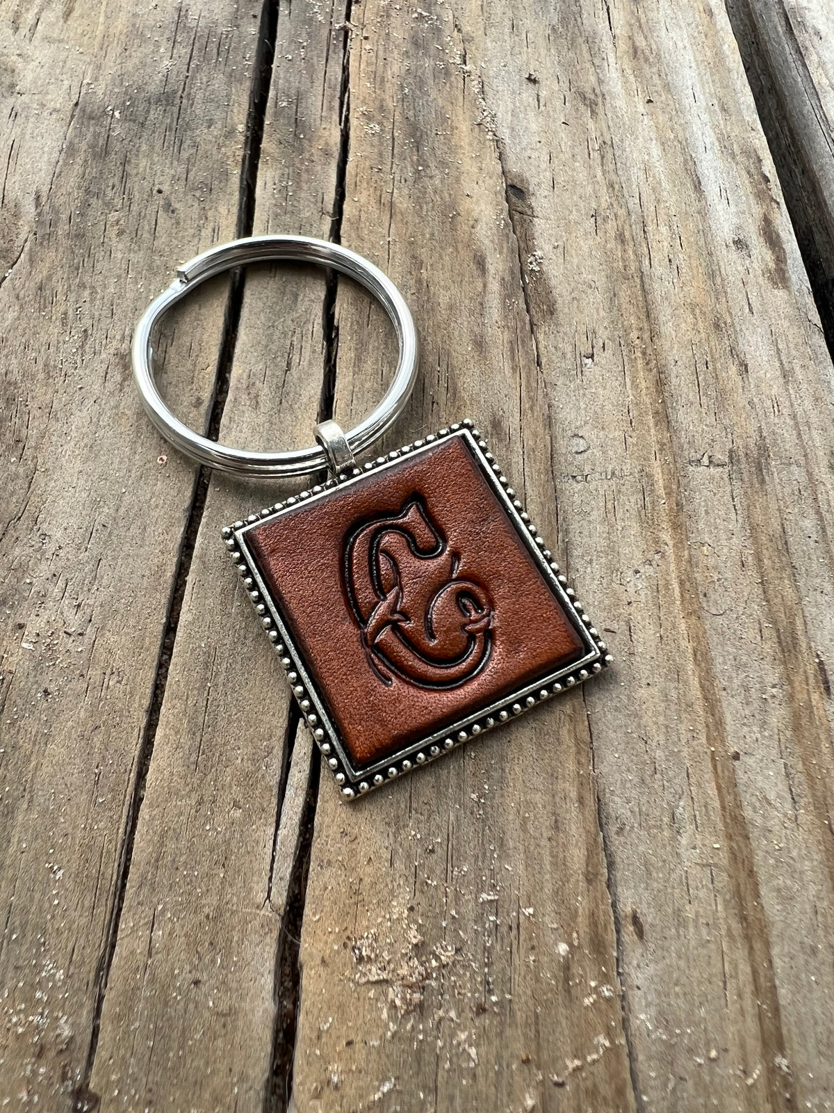 Hand Stamped Leather Initial Keychains – Floral Script Font