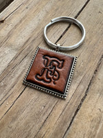 Hand Stamped Leather Initial Keychains – Floral Script Font