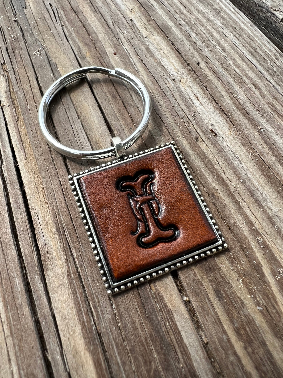 Hand Stamped Leather Initial Keychains – Floral Script Font