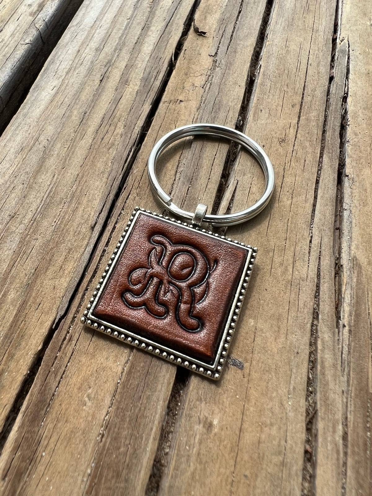 Hand Stamped Leather Initial Keychains – Floral Script Font