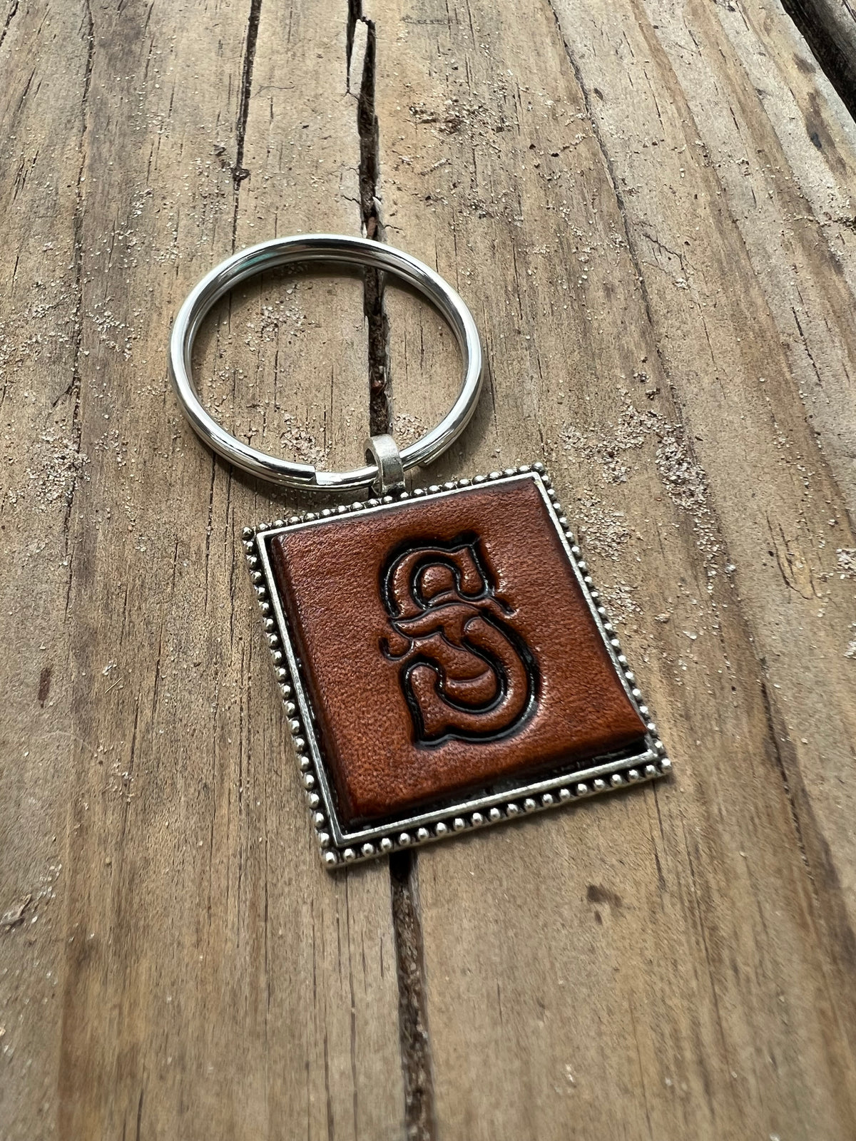 Hand Stamped Leather Initial Keychains – Floral Script Font