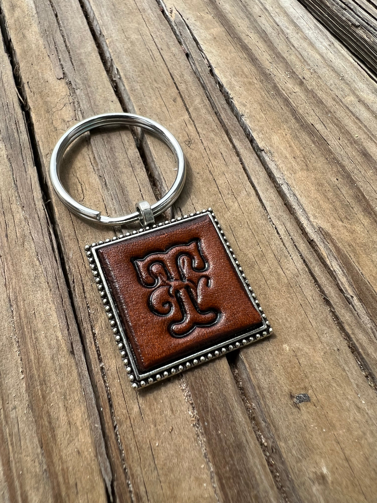 Hand Stamped Leather Initial Keychains – Floral Script Font