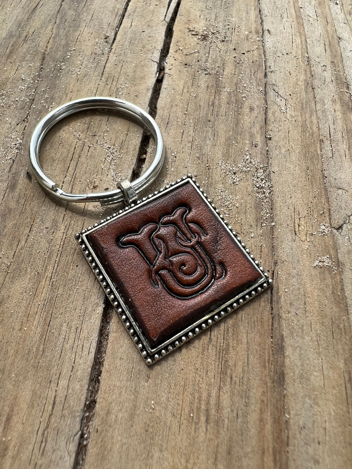 Hand Stamped Leather Initial Keychains – Floral Script Font