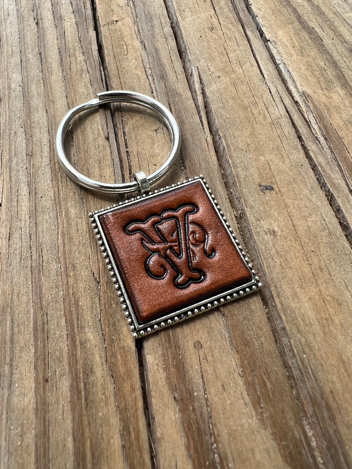 Hand Stamped Leather Initial Keychains – Floral Script Font