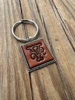 Hand Stamped Leather Initial Keychains – Floral Script Font