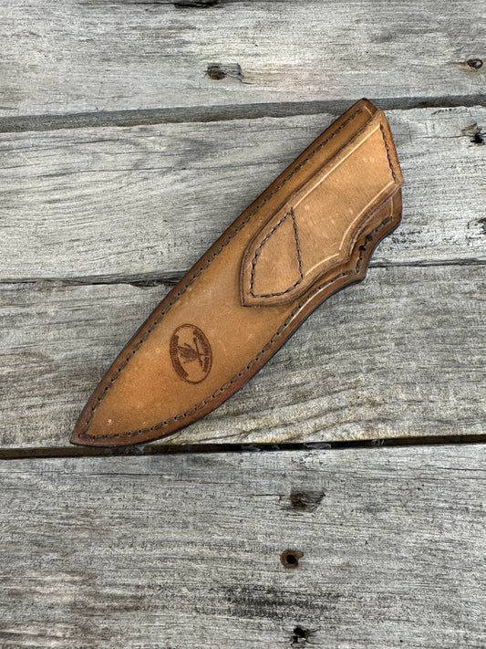 Handmade light brown leather knife sheath for 6–6½" fixed blade knives, hand stitched with brown waxed thread by Cherokee Rose Custom Leather.