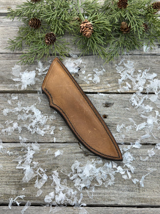 Handmade light brown leather knife sheath for 6–6½" fixed blade knives, hand stitched with brown waxed thread by Cherokee Rose Custom Leather.