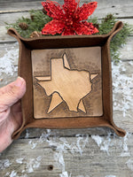 Hand-tooled leather valet tray with carved Texas state outline and Lone Star background, handmade by Cherokee Rose Custom Leather in Texas.