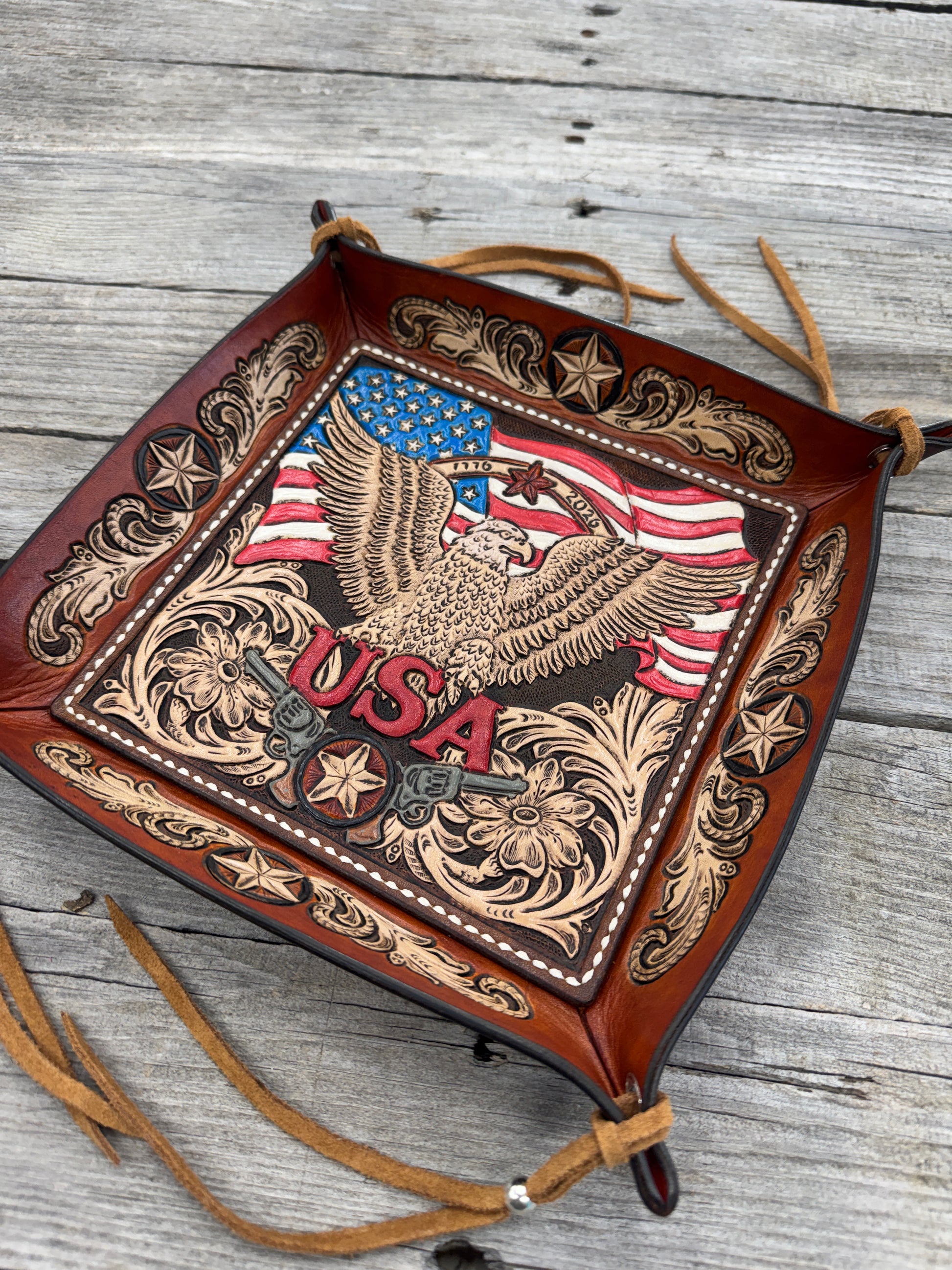 One-of-a-kind leather valet tray with hand carved bald eagle, USA design and suede corner lacing