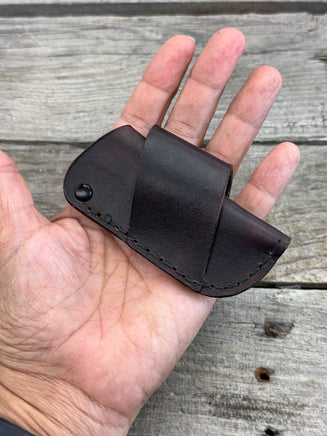 Handmade chocolate brown leather knife sheath with black rivet hardware, horizontal carry design for small pocket knives by Cherokee Rose Custom Leather.