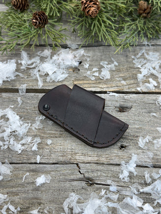 Handmade chocolate brown leather knife sheath with black rivet hardware, horizontal carry design for small pocket knives by Cherokee Rose Custom Leather.