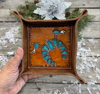 Hand-tooled leather valet tray with turquoise squash blossom necklace design and geometric stamped border, handmade by Cherokee Rose Custom Leather in Texas.