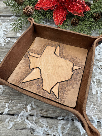 Hand-tooled leather valet tray with carved Texas state outline and Lone Star background, handmade by Cherokee Rose Custom Leather in Texas.