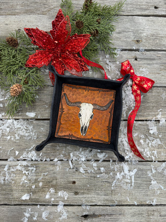 Hand-tooled leather valet tray with carved Texas longhorn skull and barbed wire border, black-dyed leather tray handmade by Cherokee Rose Custom Leather in Texas.