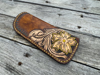 Hand tooled leather eyeglasses case with sunflower floral design and hand stitching, handmade by Cherokee Rose Custom Leather