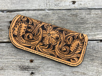 Fully hand carved Western floral leather eyeglasses case with black stitching, handmade by Cherokee Rose Custom Leather