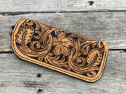 Fully hand carved Western floral leather eyeglasses case with black stitching, handmade by Cherokee Rose Custom Leather