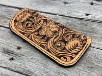 Fully hand carved Western floral leather eyeglasses case with black stitching, handmade by Cherokee Rose Custom Leather