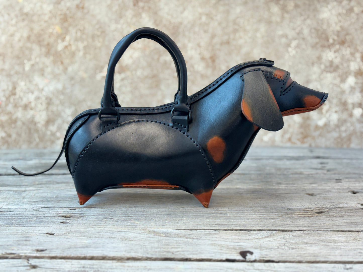 Handmade black and tan leather dachshund purse with handles and dimensional wiener dog shape