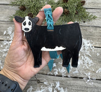 Hand-painted black and white leather show heifer purse hanger (“panda cow”) with turquoise suede strap, handmade by Cherokee Rose Custom Leather in Texas.