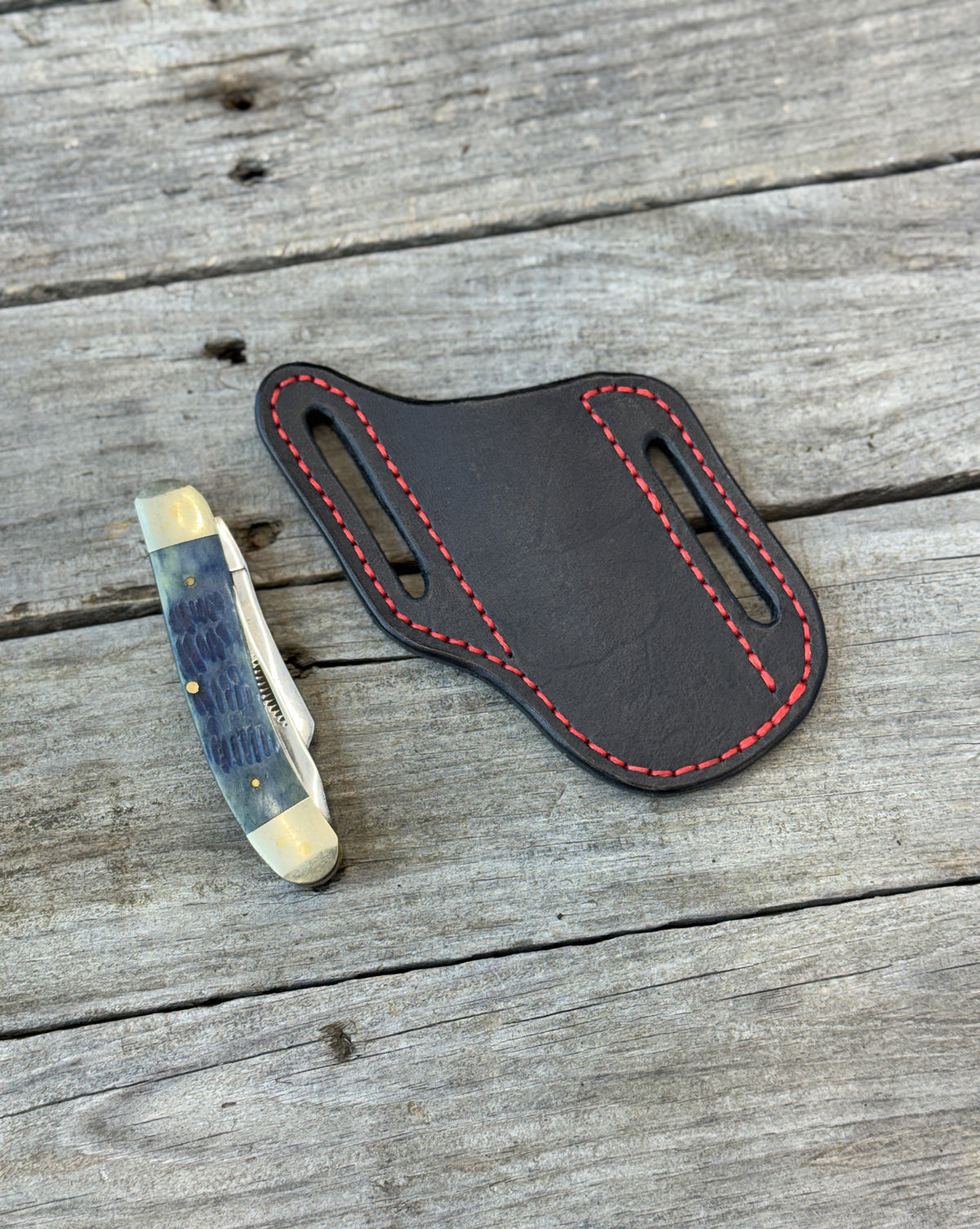 Black with Red Stitching Slanted Pancake Pocket Knife Sheath