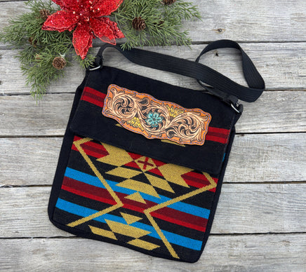 Boho Western messenger bag with hand-tooled sunflower and turquoise scroll leather patch, handmade by Cherokee Rose Custom Leather in East Texas.