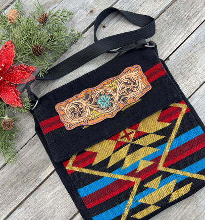 Boho Western messenger bag with hand-tooled sunflower and turquoise scroll leather patch, handmade by Cherokee Rose Custom Leather in East Texas.